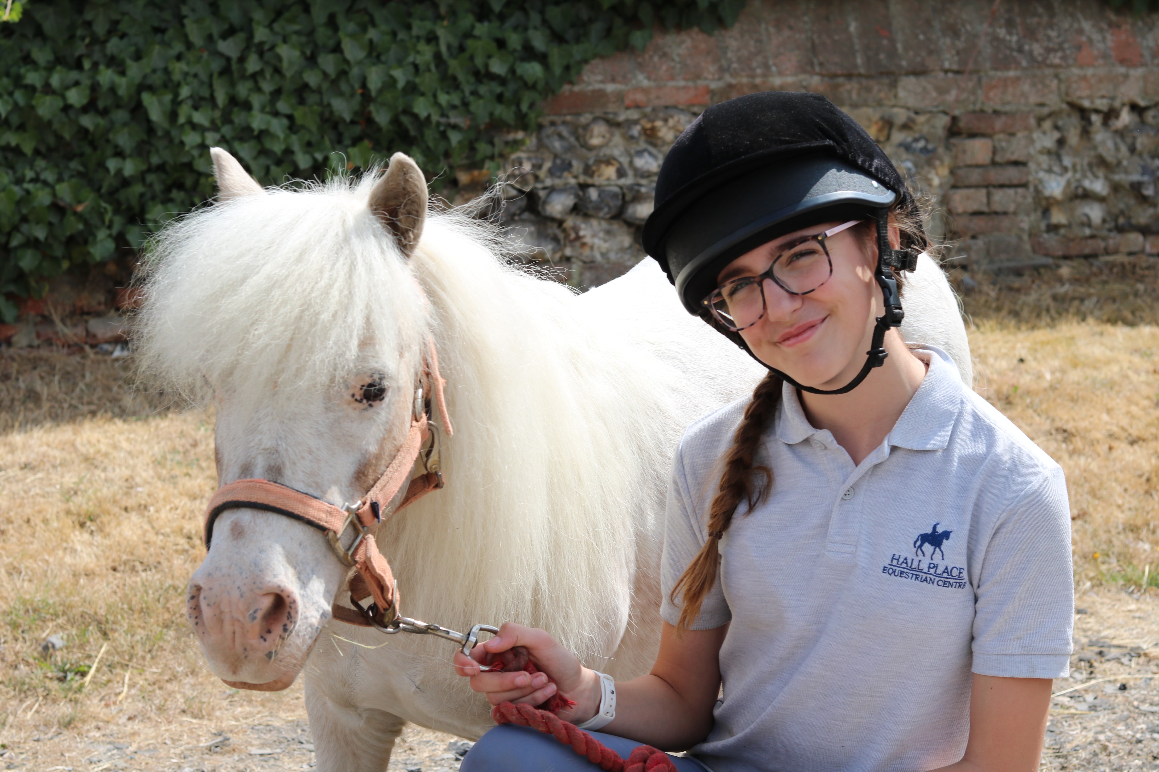 Toddler on their first pony ride
